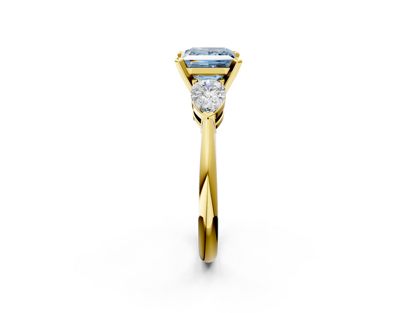 Yellow gold Three-Stone Fancy Blue Princess Cut Diamond Ring with Pear Side Stones and Four-Prong Setting