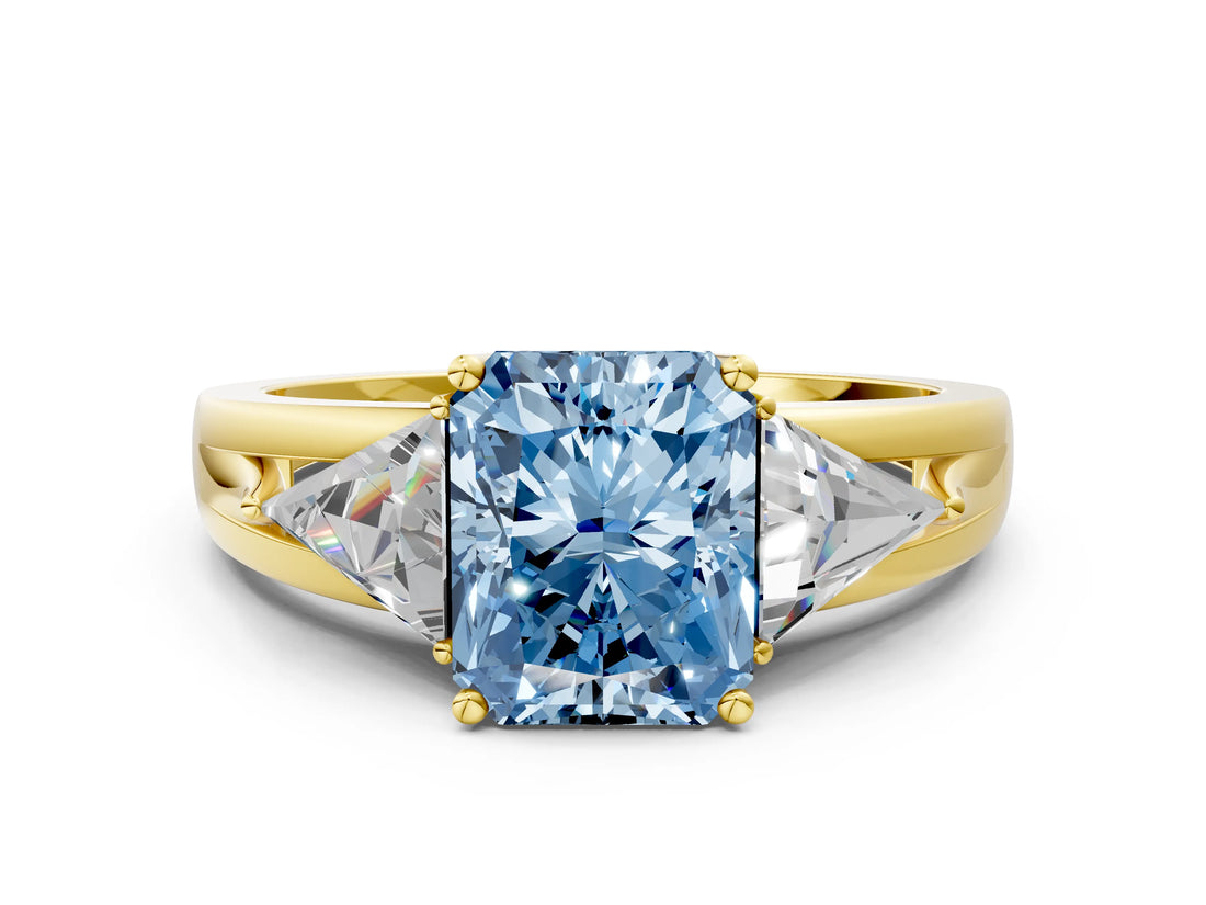 Yellow gold Three-Stone Fancy Blue Radiant Cut Cut Diamond Ring with Trillion Side Stones on a Split Shank Band