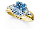 Yellow gold Three-Stone Fancy Blue Radiant Cut Cut Diamond Ring with Trillion Side Stones on a Split Shank Band_1