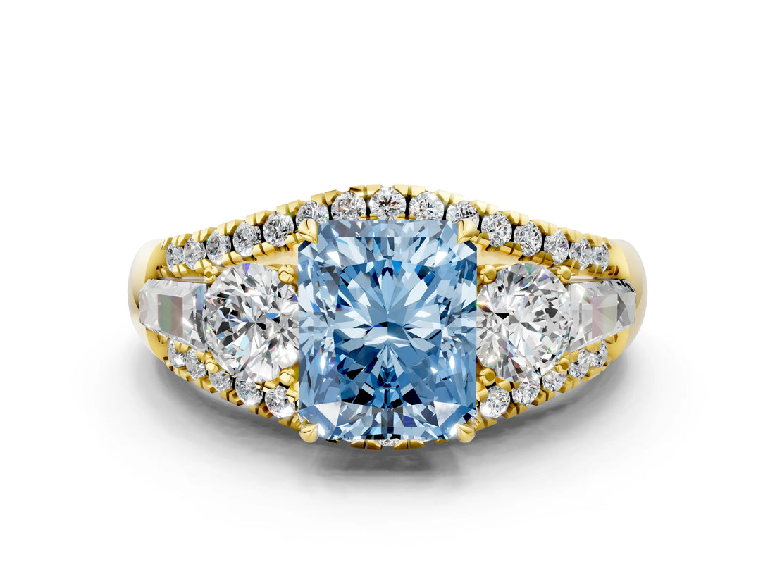 Yellow gold Three-Stone Fancy Blue Radiant Cut Diamond Engagement Ring with Pave Band and Prong Setting