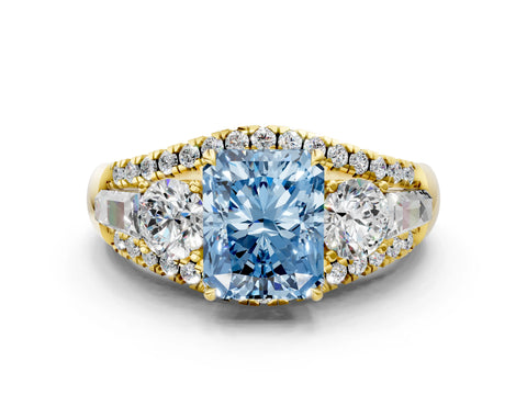 Yellow gold Three-Stone Fancy Blue Radiant Cut Diamond Engagement Ring with Pave Band and Prong Setting