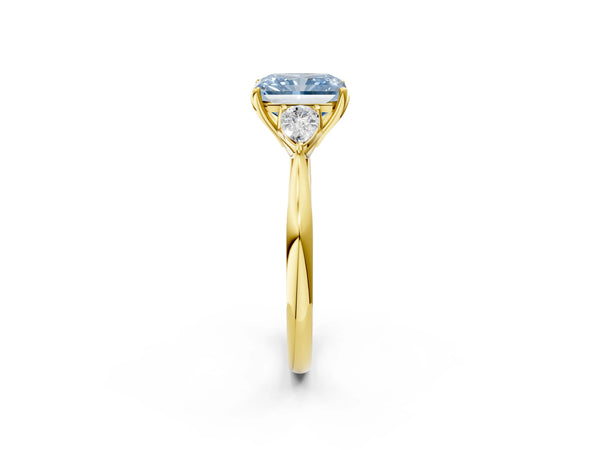 Yellow gold Three-Stone Fancy Blue Radiant Cut Diamond Ring with Pear  Side Stones in Four-Prong Setting
