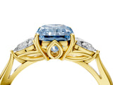 Yellow gold Three-Stone Fancy Blue Radiant Cut Diamond Ring with Pear  Side Stones in Four-Prong Setting_40