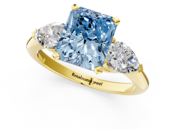 Yellow gold Three-Stone Fancy Blue Radiant Cut Diamond Ring with Pear Side Stones and Four-Prong Setting