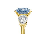 Yellow gold Three-Stone Fancy Blue Radiant  Diamond Ring with Pear Side Stones in Four-Prong Setting_90