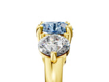 Yellow gold Three-Stone Fancy Blue Round  Brilliant Cut Solitaire Ring with Prong Setting on a Classic Band