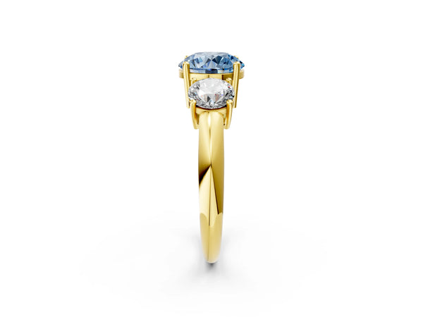 Yellow gold Three-Stone Fancy Blue Round Cut Cut Diamond Engagement Ring with Prong Setting on a White Gold Band