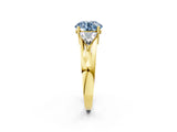 Yellow gold Three-Stone Fancy Blue Round Cut Cut Diamond Ring with Trillion Side Stones on a Split Shank Band_2