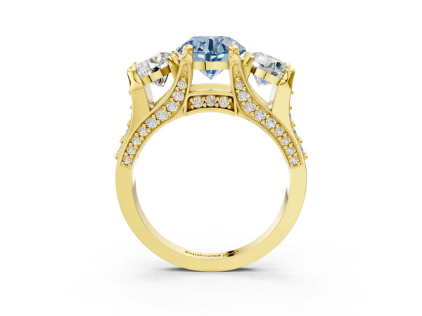 Yellow gold Fancy Blue Round Cut Diamond Three-Stone Ring with Channel Set Band and Four-Prong Setting