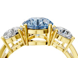 Yellow gold Three-Stone Fancy Blue Round Cut Diamond Ring with Round Side Stones, Classic Band, and Four-Prong Setting_4