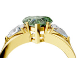 Yellow gold Three-Stone Fancy Green Heart Cut Cut Diamond Ring with Trillion Side Stones on a Split Shank Band_4