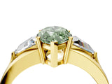 Yellow gold Three-Stone Fancy Green Marquise Cut Cut Diamond Ring with Trillion Side Stones on a Split Shank Band_4