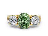 Yellow gold Three-Stone Fancy Green Oval Cut Diamond Ring with Round Side Stones, Classic Band, and Four-Prong Setting