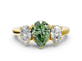 Yellow gold Three-Stone Fancy Green Pear Cut Cut Diamond Ring with Channel Set Band and Four-Prong Setting