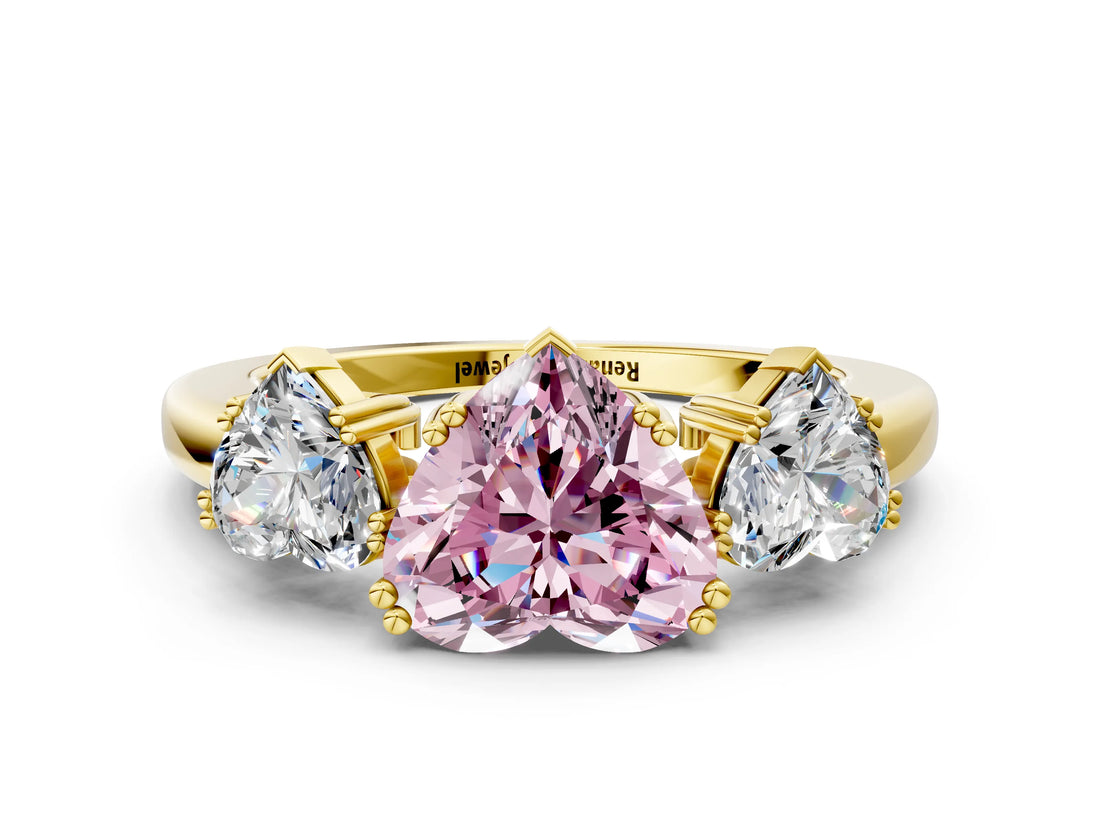 Yellow gold Three-Stone Fancy Pink Heart Cut Cut Diamond Ring with Channel Set Band and Four-Prong Setting