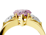 Yellow gold Three-Stone Fancy Pink Heart Cut Cut Diamond Ring with Trillion Side Stones on a Split Shank Band_4