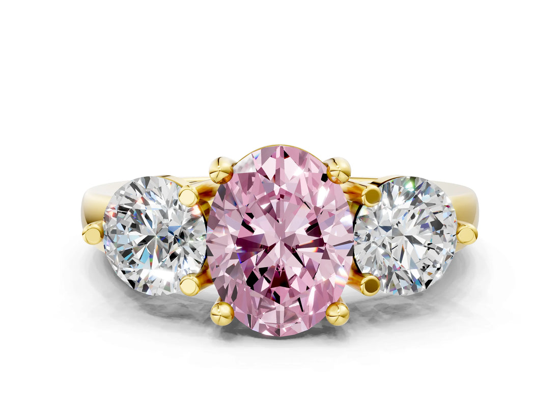 Yellow gold Three-Stone Fancy Pink Oval  Brilliant Cut Solitaire Ring with Prong Setting on a Classic Band