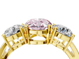 Yellow gold Three-Stone Fancy Pink Oval Cut Diamond Ring with Round Side Stones, Classic Band, and Four-Prong Setting_4