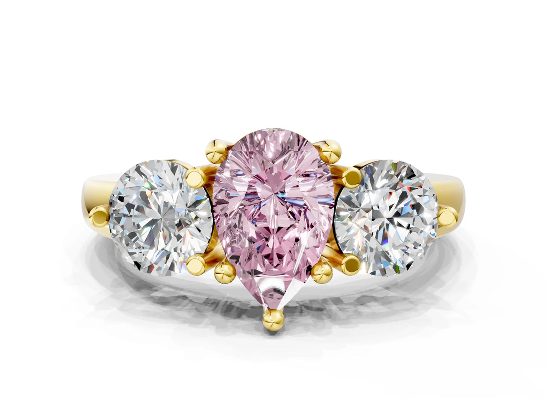 Yellow gold Three-Stone Fancy Pink Pear  Brilliant Cut Solitaire Ring with Prong Setting on a Classic Band