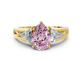 Yellow gold Three-Stone Fancy Pink Pear Cut Cut Diamond Ring with Trillion Side Stones on a Split Shank Band