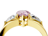 Yellow gold Three-Stone Fancy Pink Pear Cut Cut Diamond Ring with Trillion Side Stones on a Split Shank Band_4