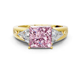 Yellow gold Three-Stone Fancy Pink Princess Cut Cut Diamond Ring with Trillion Side Stones on a Split Shank Band