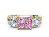 Yellow gold Three-Stone Fancy Pink Princess Cut Diamond Ring with Round Side Stones, Classic Band, and Four-Prong Setting