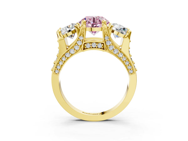 Yellow gold Fancy Pink Round Cut Diamond Three-Stone Ring with Channel Set Band and Four-Prong Setting