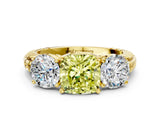 Yellow gold Three-Stone Fancy Yellow Cushion Cut Cut Diamond Ring with Channel-Set Band and Prong Setting