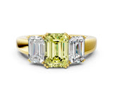 Yellow gold Three-Stone Fancy Yellow Emerald Cut Cut Diamond Ring with Channel Set Band and Four-Prong Setting_24