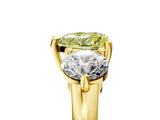 Yellow gold Three-Stone Fancy Yellow Heart  Brilliant Cut Solitaire Ring with Prong Setting on a Classic Band
