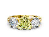 Yellow gold Three-Stone Fancy Yellow Heart Cut Cut Diamond Ring with Channel-Set Band and Prong Setting