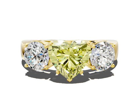 Yellow gold Three-Stone Fancy Yellow Heart Cut Diamond Ring with Round Side Stones, Classic Band, and Four-Prong Setting