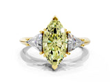 Yellow gold Three-Stone Fancy Yellow Marquise Cut Cut Diamond Ring with Trillion Side Stones and Four-Prong Setting_3