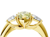 Yellow gold Three-Stone Fancy Yellow Marquise Cut Cut Diamond Ring with Trillion Side Stones and Four-Prong Setting_7