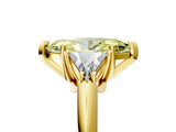 Yellow gold Three-Stone Fancy Yellow Marquise Cut Cut Diamond Ring with Trillion Side Stones and Four-Prong Setting_8