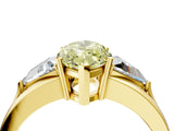 Yellow gold Three-Stone Fancy Yellow Marquise Cut Cut Diamond Ring with Trillion Side Stones on a Split Shank Band_4