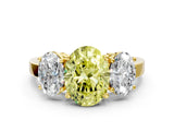 Yellow gold Three-Stone Fancy Yellow Oval Cut Cut Diamond Engagement Ring with Flat Band and Four-Prong Setting