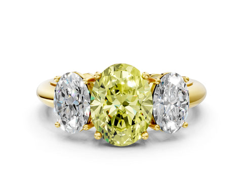 Yellow gold Three-Stone Fancy Yellow Oval Cut Cut Diamond Engagement Ring with Prong Setting on a White Gold Band