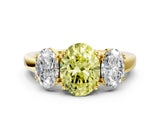 Yellow gold Three-Stone Fancy Yellow Oval Cut Cut Diamond Ring with Channel Set Band and Four-Prong Setting_24