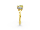Yellow gold Three-Stone Fancy Yellow Oval Cut Cut Diamond Ring with Channel Set Band and Four-Prong Setting_26