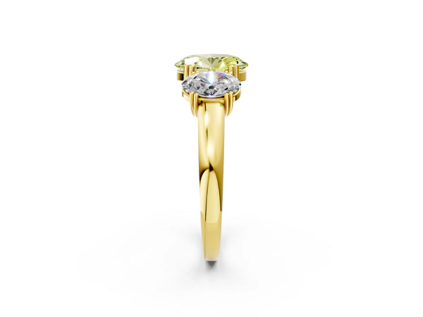 Yellow gold Three-Stone Fancy Yellow Oval Cut Cut Diamond Ring with Channel Set Band and Four-Prong Setting