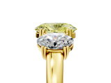 Yellow gold Three-Stone Fancy Yellow Oval Cut Cut Diamond Ring with Channel Set Band and Four-Prong Setting_29