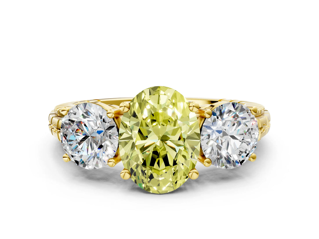 Yellow gold Three-Stone Fancy Yellow Oval Cut Cut Diamond Ring with Channel-Set Band and Prong Setting