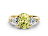 Yellow gold Three-Stone Fancy Yellow Oval Cut Cut Diamond Ring with Trillion Side Stones and Four-Prong Setting_3