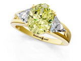 Yellow gold Three-Stone Fancy Yellow Oval Cut Cut Diamond Ring with Trillion Side Stones on a Split Shank Band_1