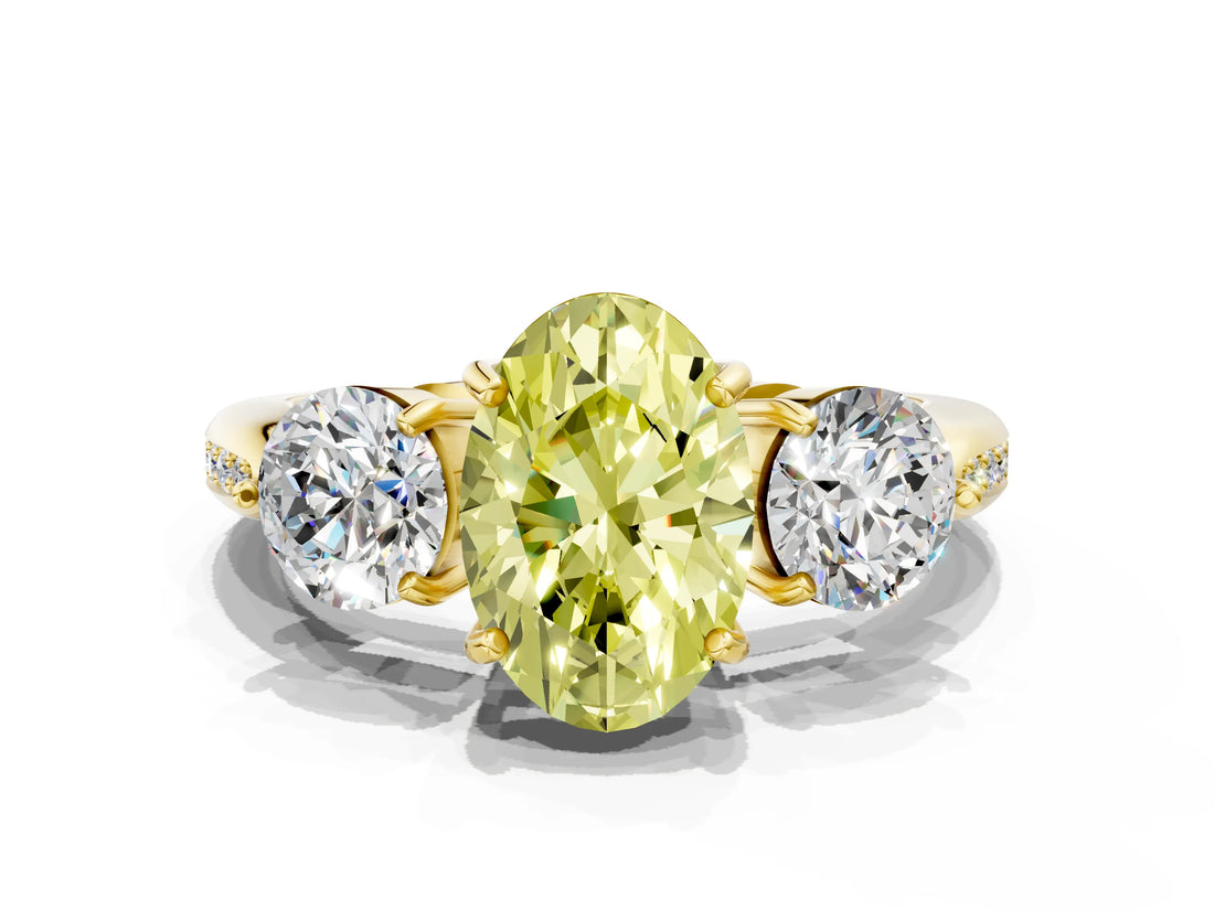 Yellow gold Three-Stone Fancy Yellow Oval Cut Diamond Channel Set Engagement Ring with Prong Setting