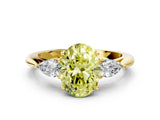 Yellow gold Three-Stone Fancy Yellow Oval Cut Diamond Ring with Pear  Side Stones in Four-Prong Setting_48
