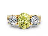 Yellow gold Three-Stone Fancy Yellow Oval Cut Diamond Ring with Round Side Stones, Classic Band, and Four-Prong Setting_12