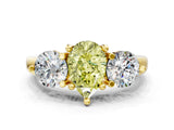 Yellow gold Three-Stone Fancy Yellow Pear  Brilliant Cut Solitaire Ring with Prong Setting on a Classic Band